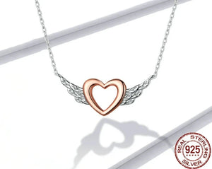 Silver heart with wings necklace