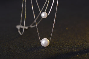 silver necklace with pearls	