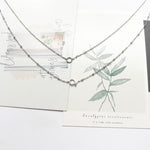 silver lotus and little buddha necklace