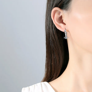 silver evil eye earrings